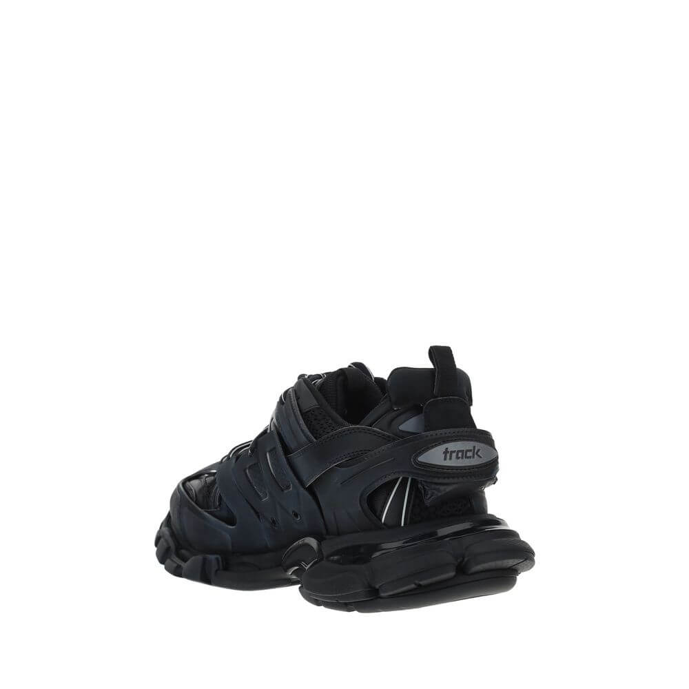 Black athletic sneakers with a multi-layered design and lace-up closure for optimal support and performance.