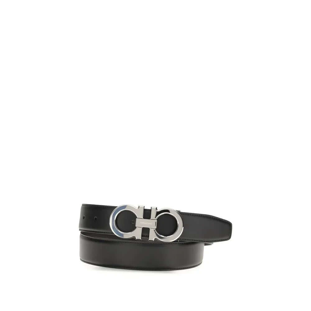 Black leather belt for men with silver metal buckle, showcasing luxury and durability.