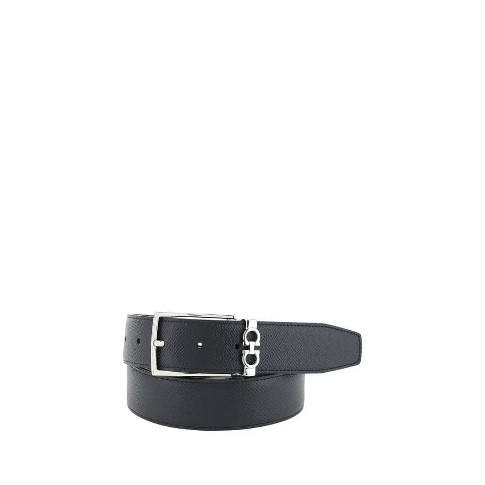 Reversible black calf leather belt featuring a sleek design and silver buckle, perfect for any stylish outfit.