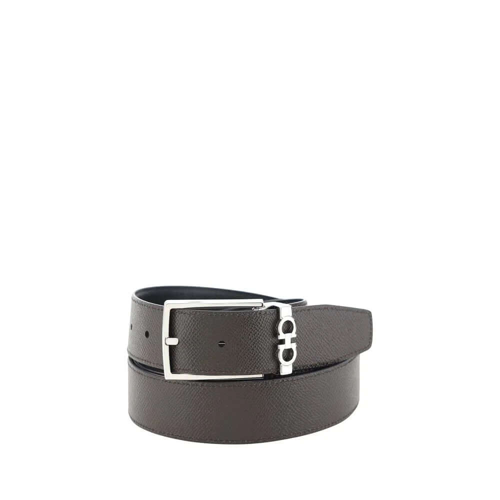 Reversible black calf leather belt featuring a sleek silver buckle and versatile design for any outfit.