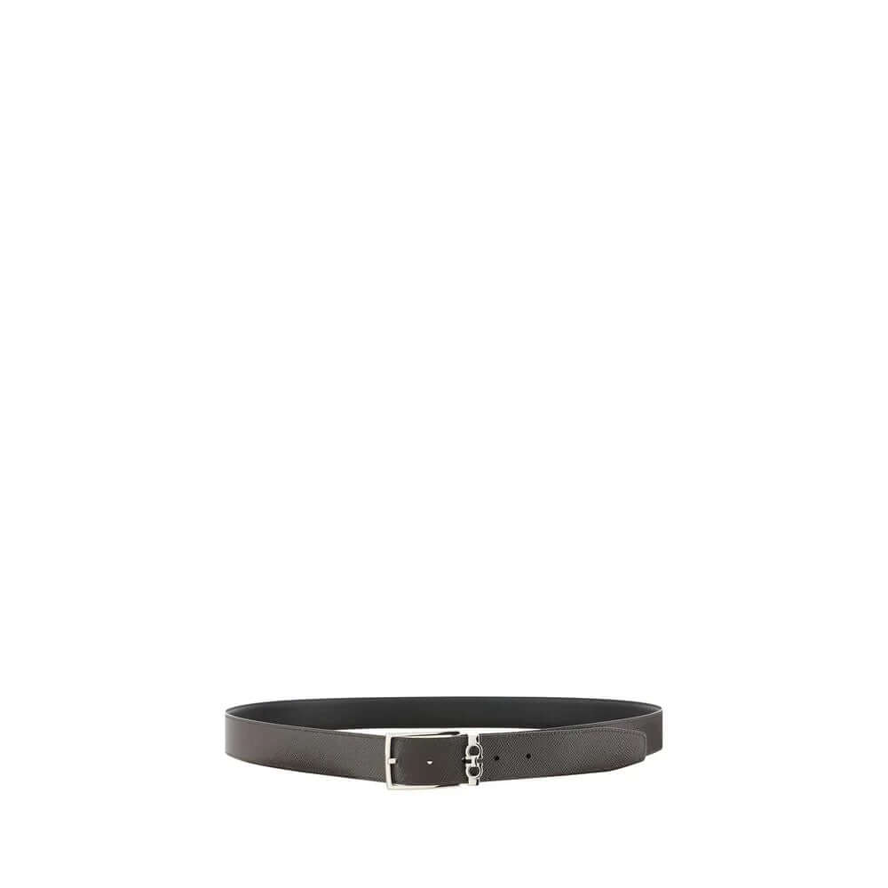 Reversible black calf leather belt showcasing its elegant design and buckle, perfect for versatile styling.