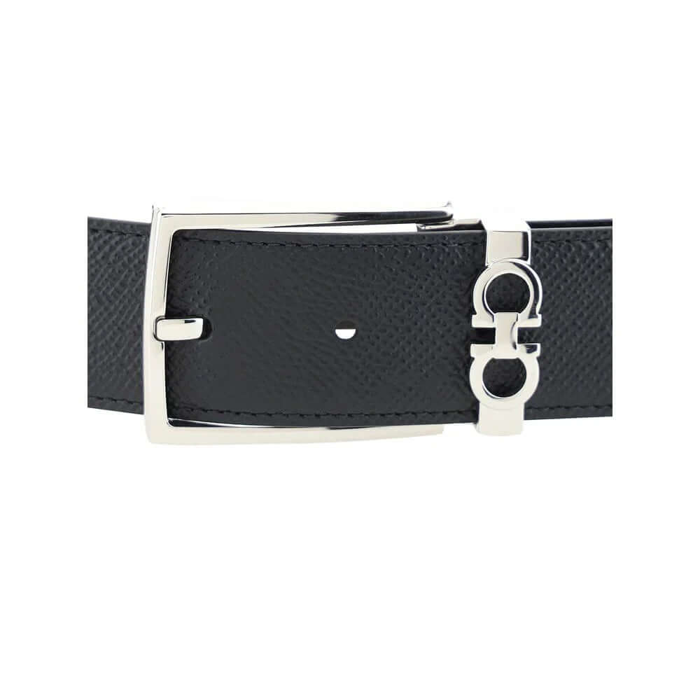 Black Calf Leather Bos Taurus Belt with sleek buckle design, showcasing luxurious grained leather craftsmanship.