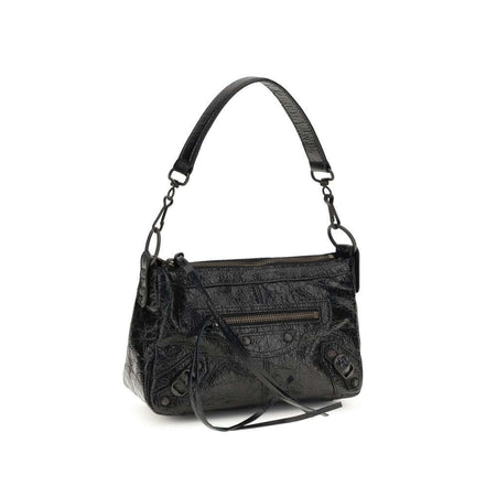 Elegant black lambskin shoulder bag with a unique textured finish and versatile strap.