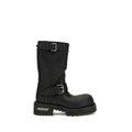 Black calf leather boot featuring buckle details, a rugged design, stylishly bold, perfect for fashion-forward looks.