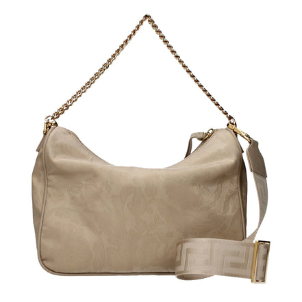 Beige fabric handbag with adjustable shoulder strap and gold chain detail.