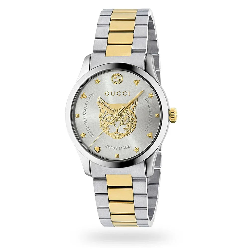 silver stainless steel dress watch with yellow gold accents and cat design on dial