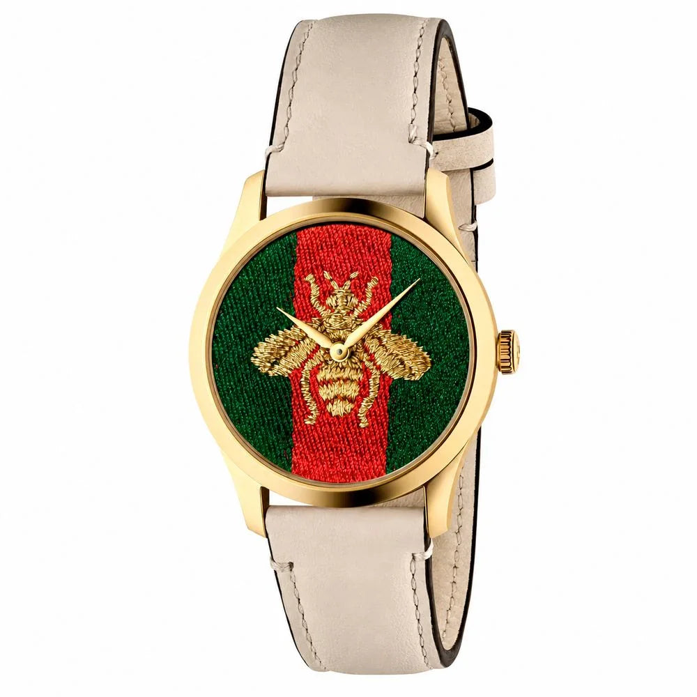 Beige leather dress watch featuring a unique bee design on a multicolored dial with golden case and buckle.