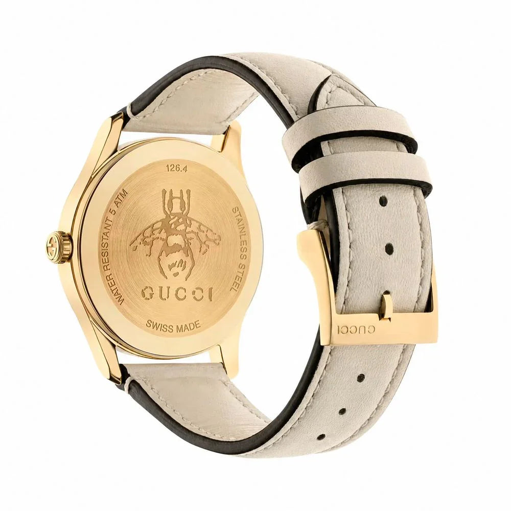 Beige leather dress watch back view showcasing gold stainless steel case and leather strap.