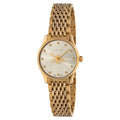 Gold stainless steel dress watch featuring quartz mechanism and sapphire glass.
