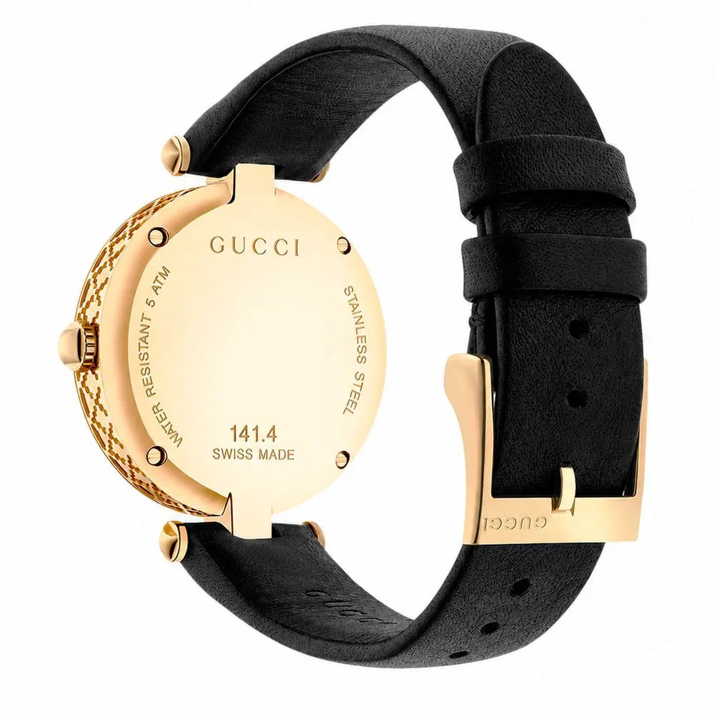 Back view of a black leather dress watch with gold stainless steel case and sapphire glass detailing.