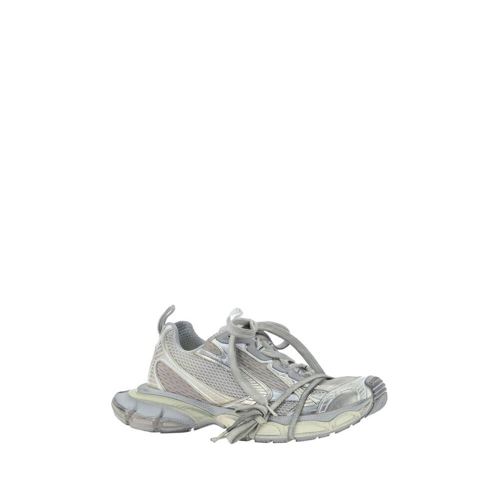 Gray chunky sneakers showcasing a bold oversized design, perfect for contemporary fashion.