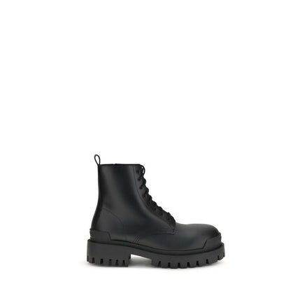 Black calf leather lace-up boots with chunky soles and a sleek design, showcasing modern craftsmanship.