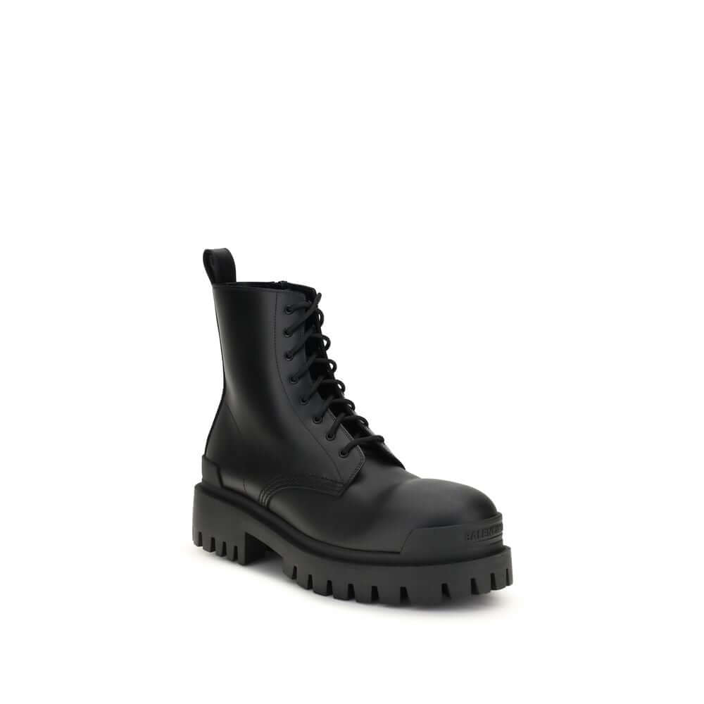 Black calf leather lace-up boots with a chunky sole and sleek design.