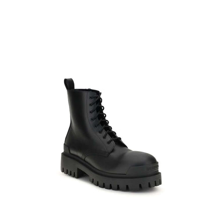 Black calf leather lace-up boots with a chunky sole and sleek design.